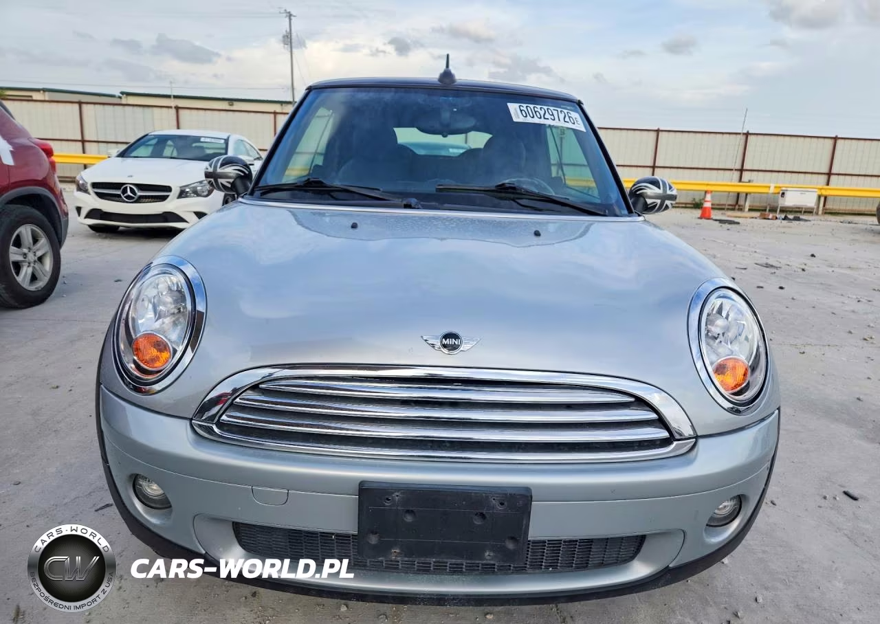2009 Mini Cooper VIN:WMWMR33599TU96005 - 5
