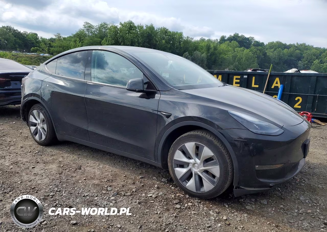 2023 Tesla Model Y VIN:7SAYGAEE0PF921478 - 4