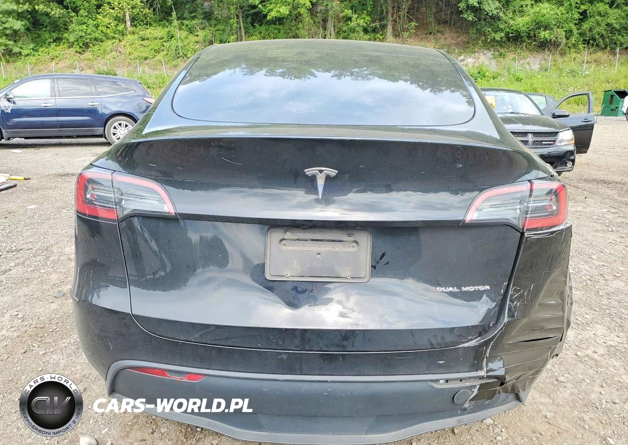 2023 Tesla Model Y VIN:7SAYGAEE0PF921478 - 6