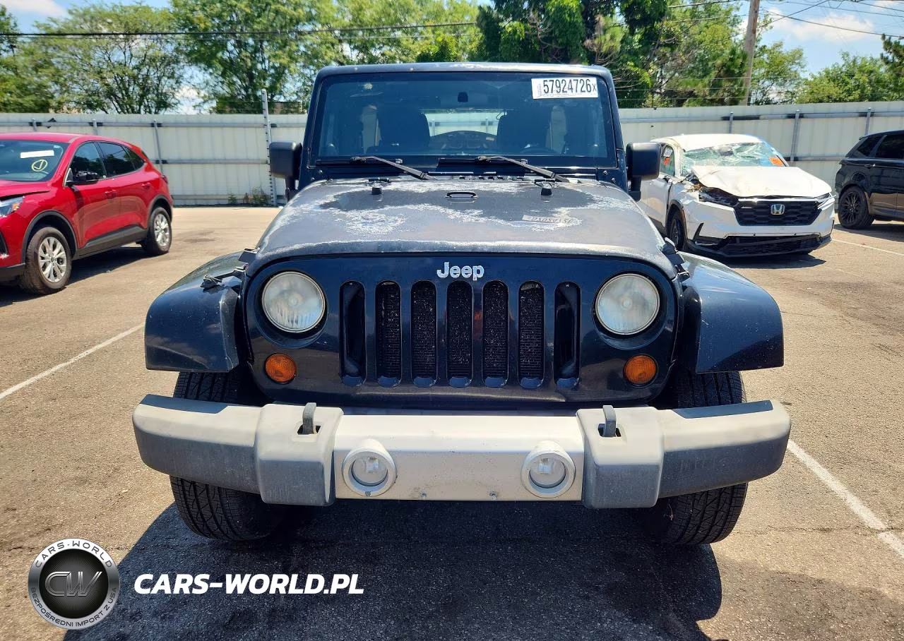 2011 Jeep Wrangler Unlimited Sahara VIN:1J4BA5H17BL616158 - 5