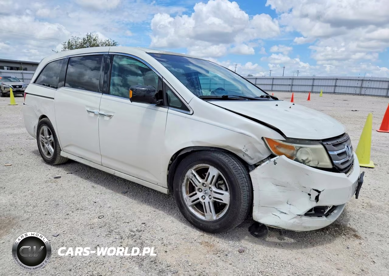 2012 Honda Odyssey Touring VIN:5FNRL5H94CB141075 - 4