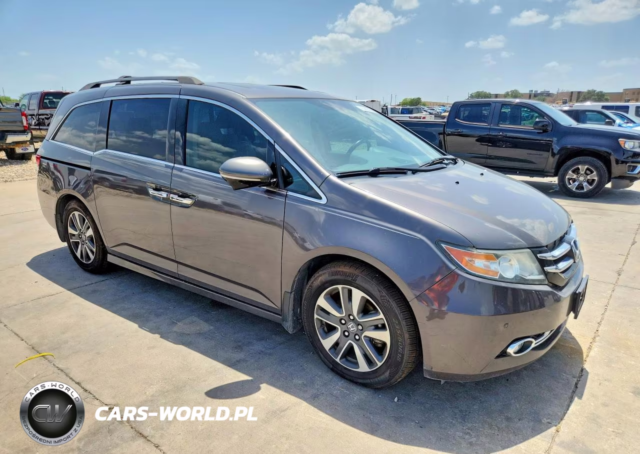 2014 Honda Odyssey Touring VIN:5FNRL5H92EB109261 - 4