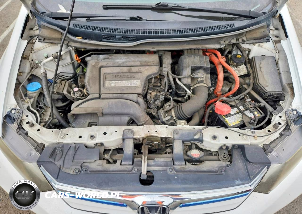 2012 Honda Civic Hybrid VIN:JHMFB4F24CS000062 - 11
