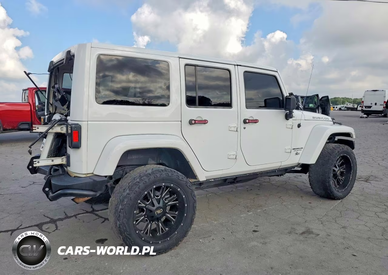 2014 Jeep Wrangler Unlimited Rubicon VIN:1C4BJWFG1EL261754 - 3