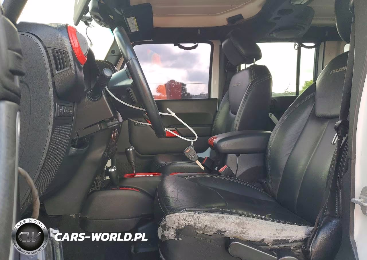 2014 Jeep Wrangler Unlimited Rubicon VIN:1C4BJWFG1EL261754 - 7
