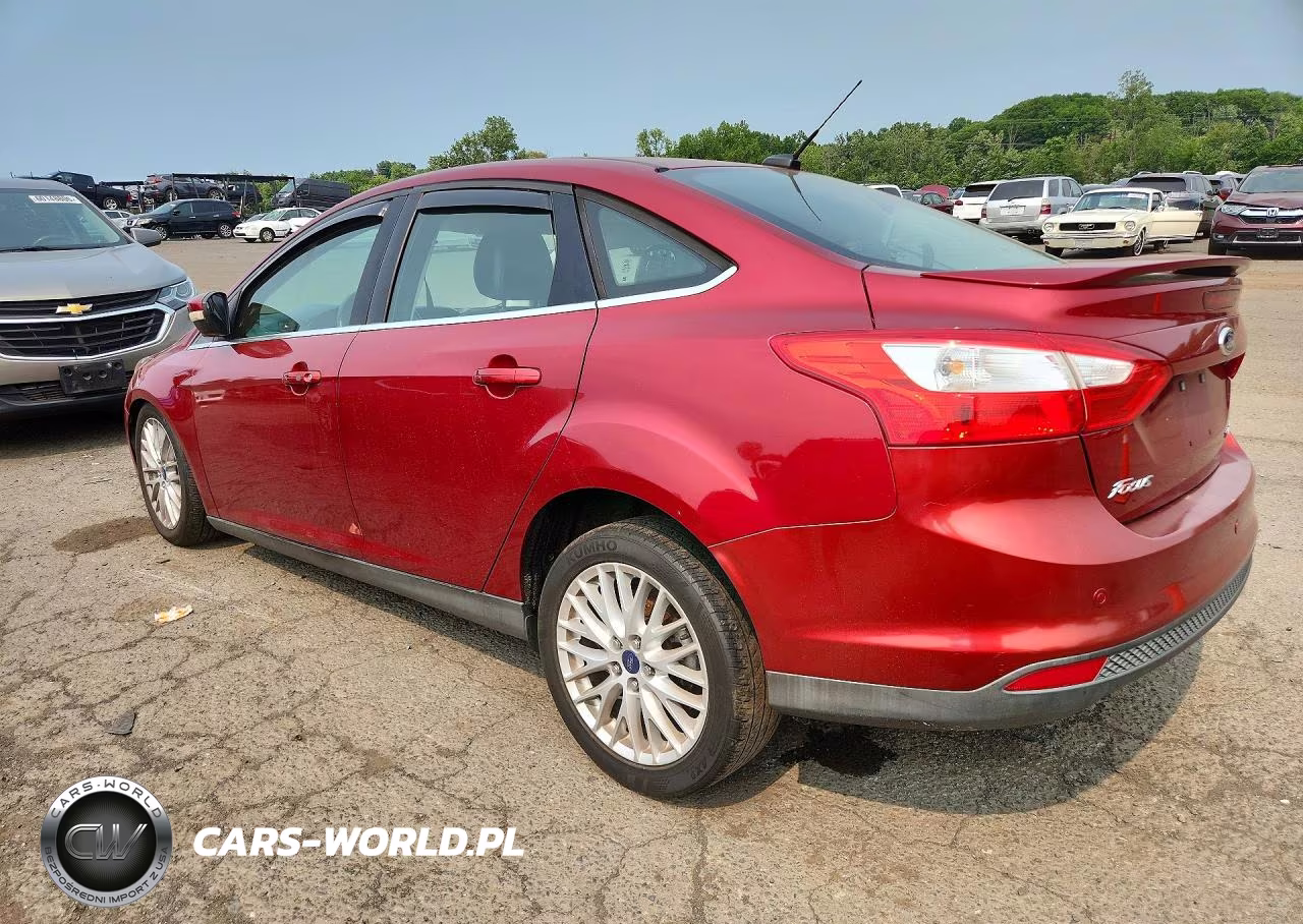 2014 Ford Focus Titanium VIN:1FADP3J23EL274299 - 2