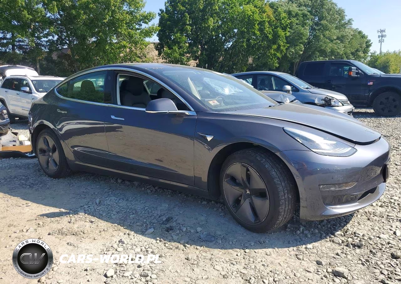 2019 Tesla Mdl 3 VIN:5YJ3E1EAXKF298521 - 4