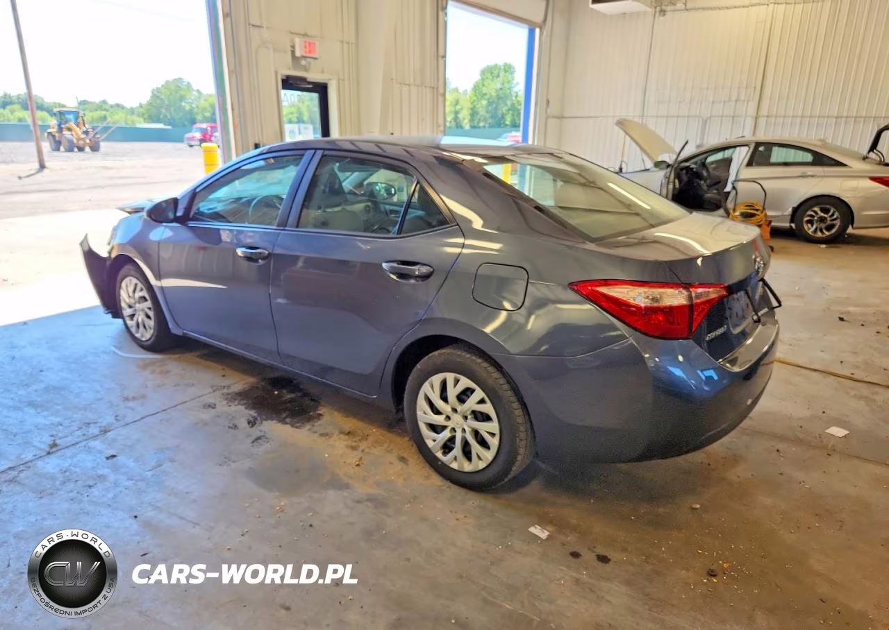 2018 Toyota Corolla Le VIN:5YFBURHE7JP831052 - 2