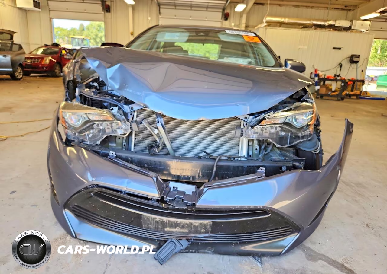 2018 Toyota Corolla Le VIN:5YFBURHE7JP831052 - 5