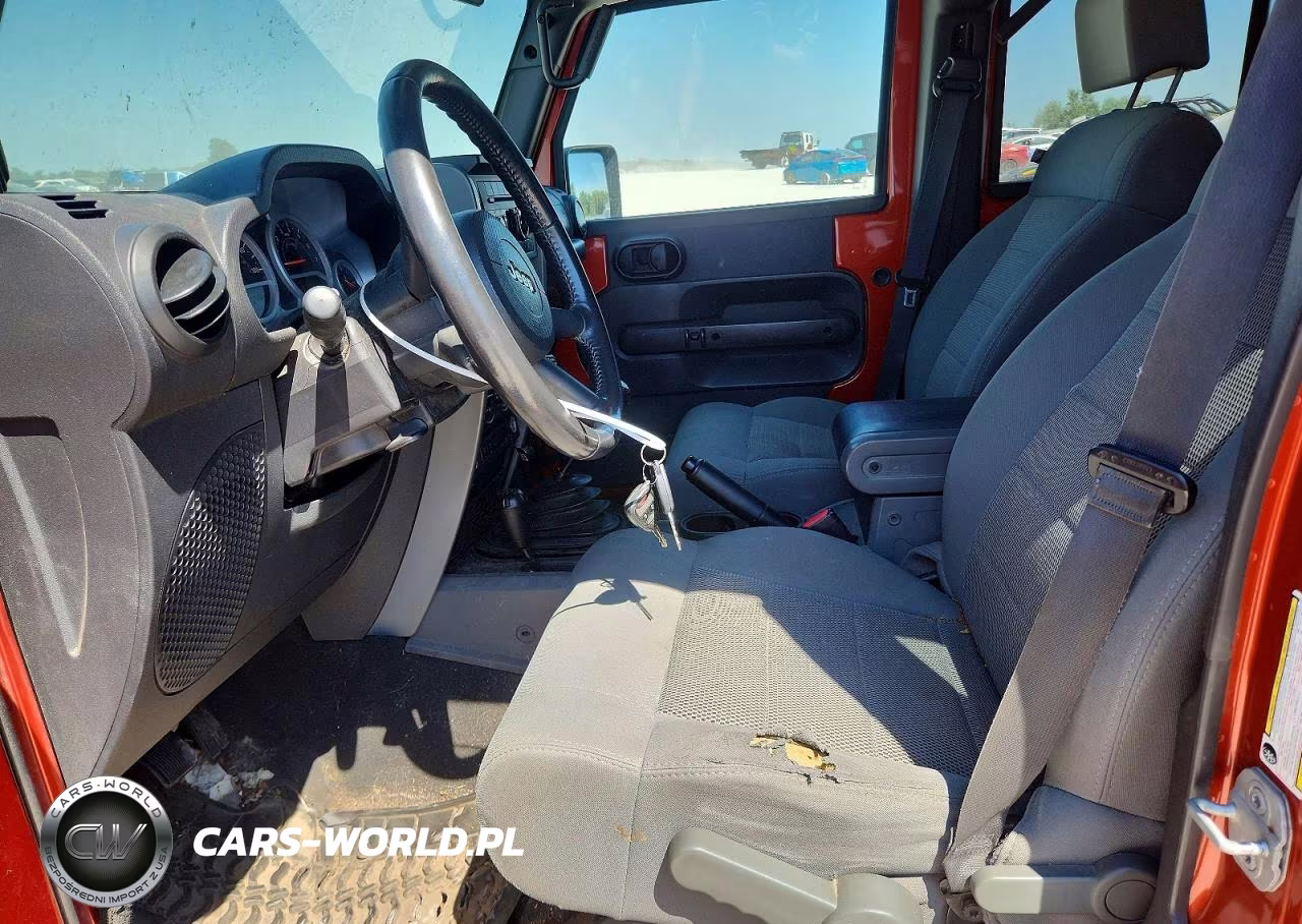 2009 Jeep Wrangler Unlimited Rubicon VIN:1J4GA691X9L749677 - 7