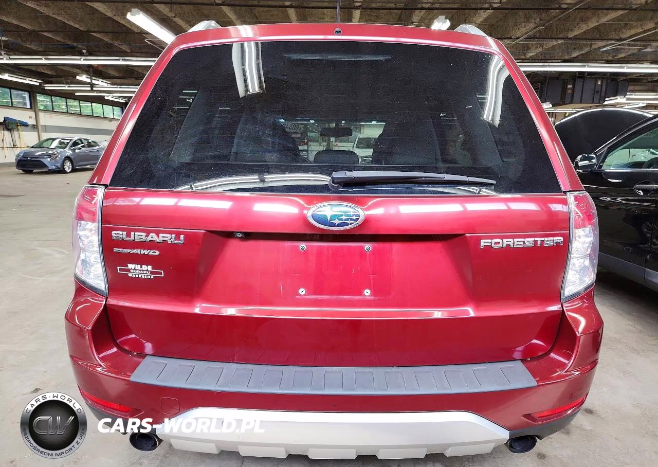 2012 Subaru Forester 2.5X Touring VIN:JF2SHBGC7CH409715 - 6