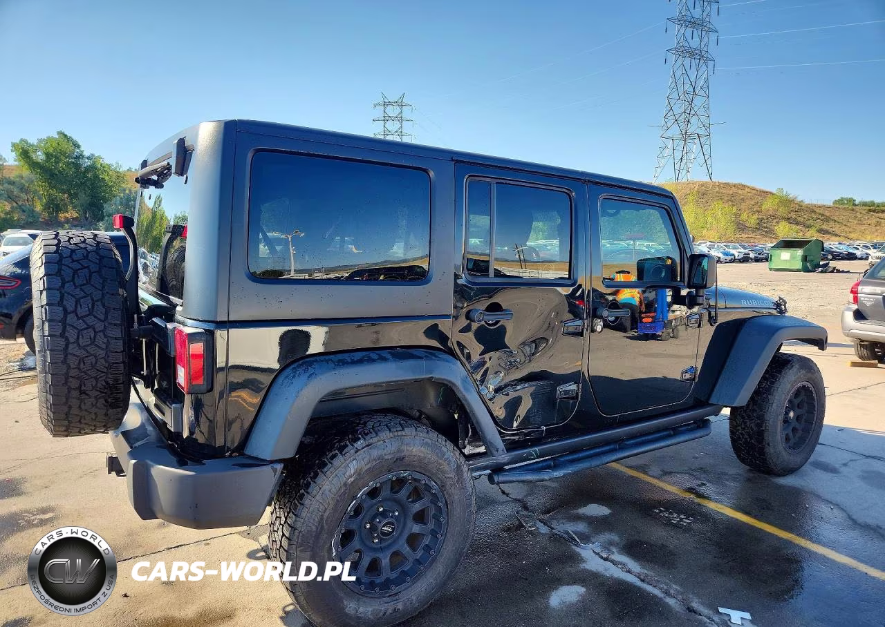 2014 Jeep Wrangler Unlimited Rubicon VIN:1C4HJWFG1EL118748 - 3