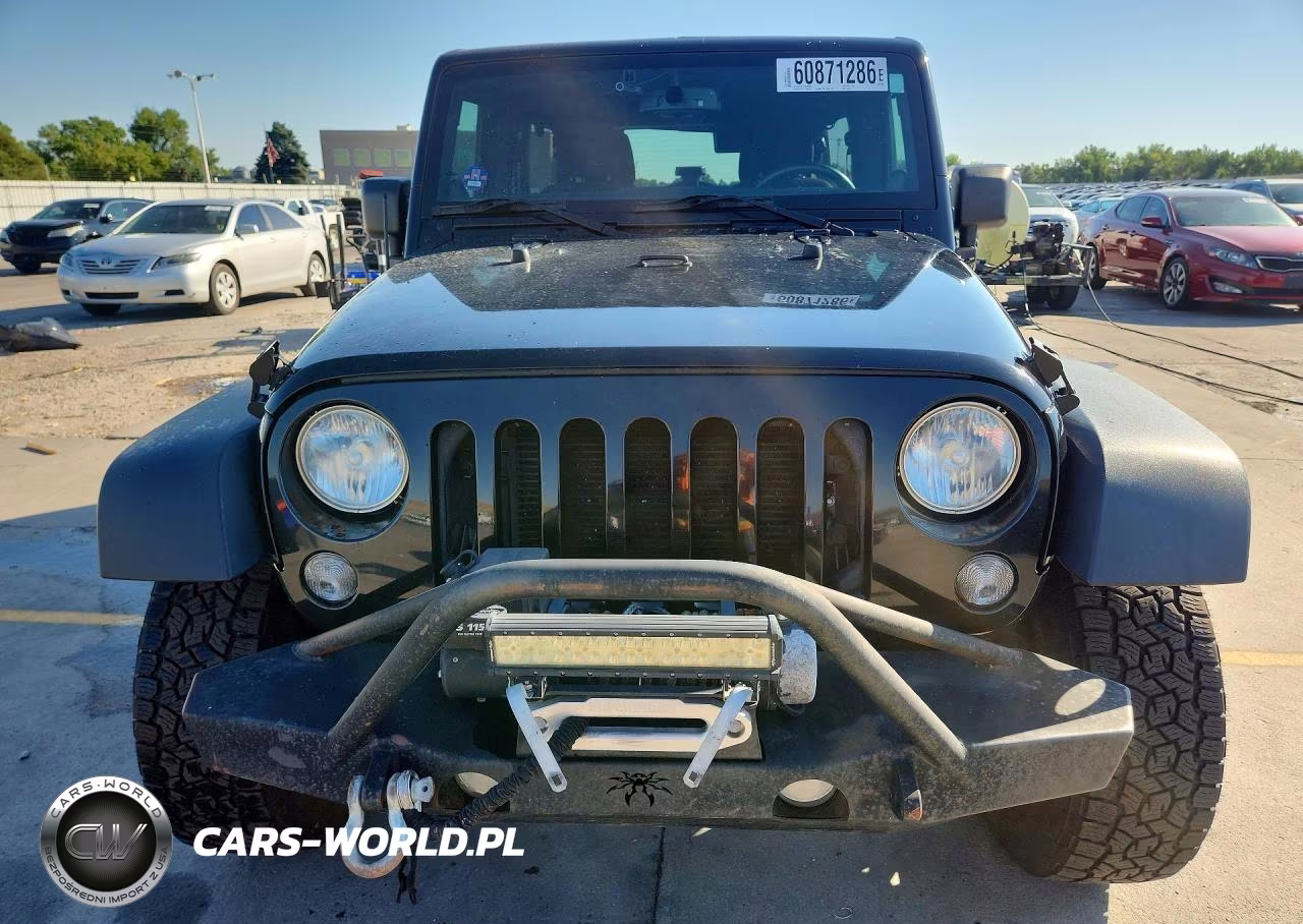 2014 Jeep Wrangler Unlimited Rubicon VIN:1C4HJWFG1EL118748 - 5