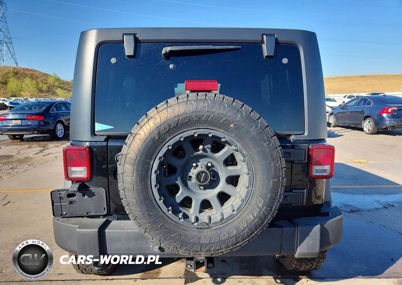 2014 Jeep Wrangler Unlimited Rubicon VIN:1C4HJWFG1EL118748 - 6