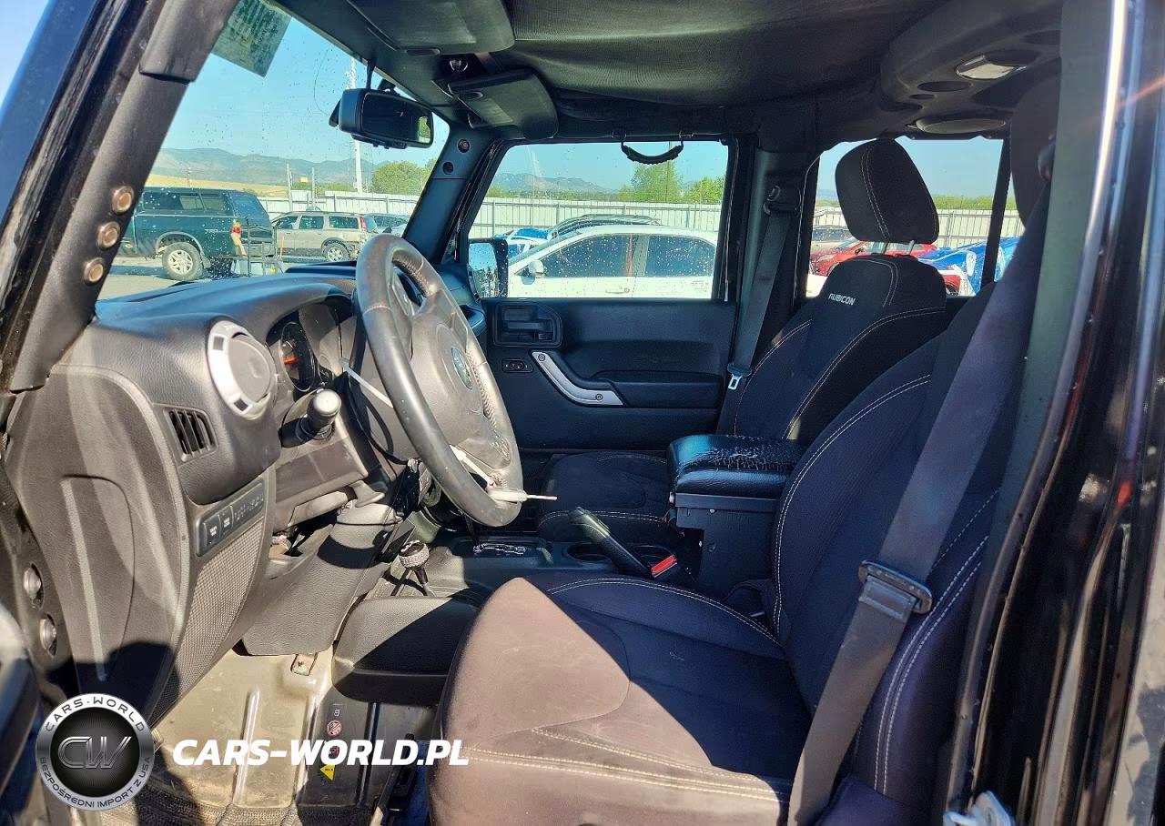 2014 Jeep Wrangler Unlimited Rubicon VIN:1C4HJWFG1EL118748 - 7