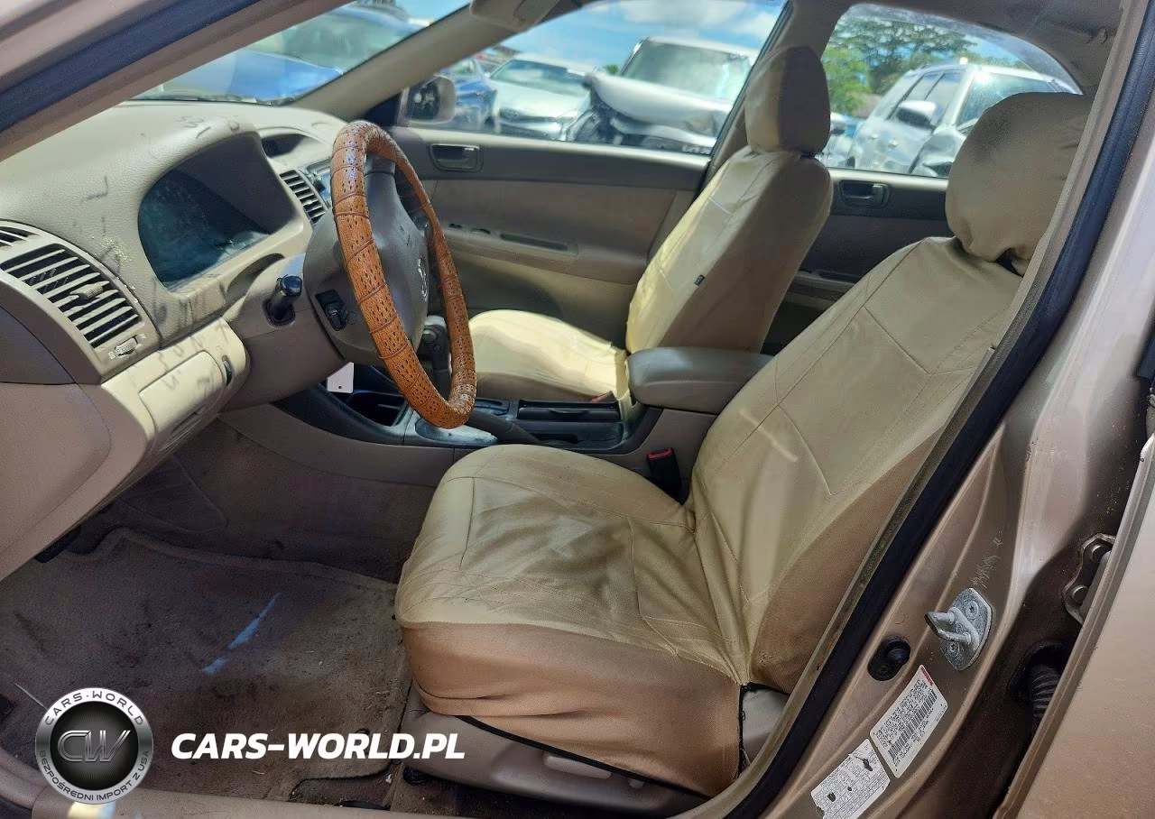2002 Toyota Camry Le VIN:JTDBE32KX20098824 - 7