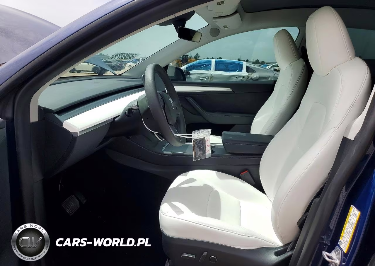 2024 Tesla Model Y VIN:7SAYGDEE1RA215170 - 7