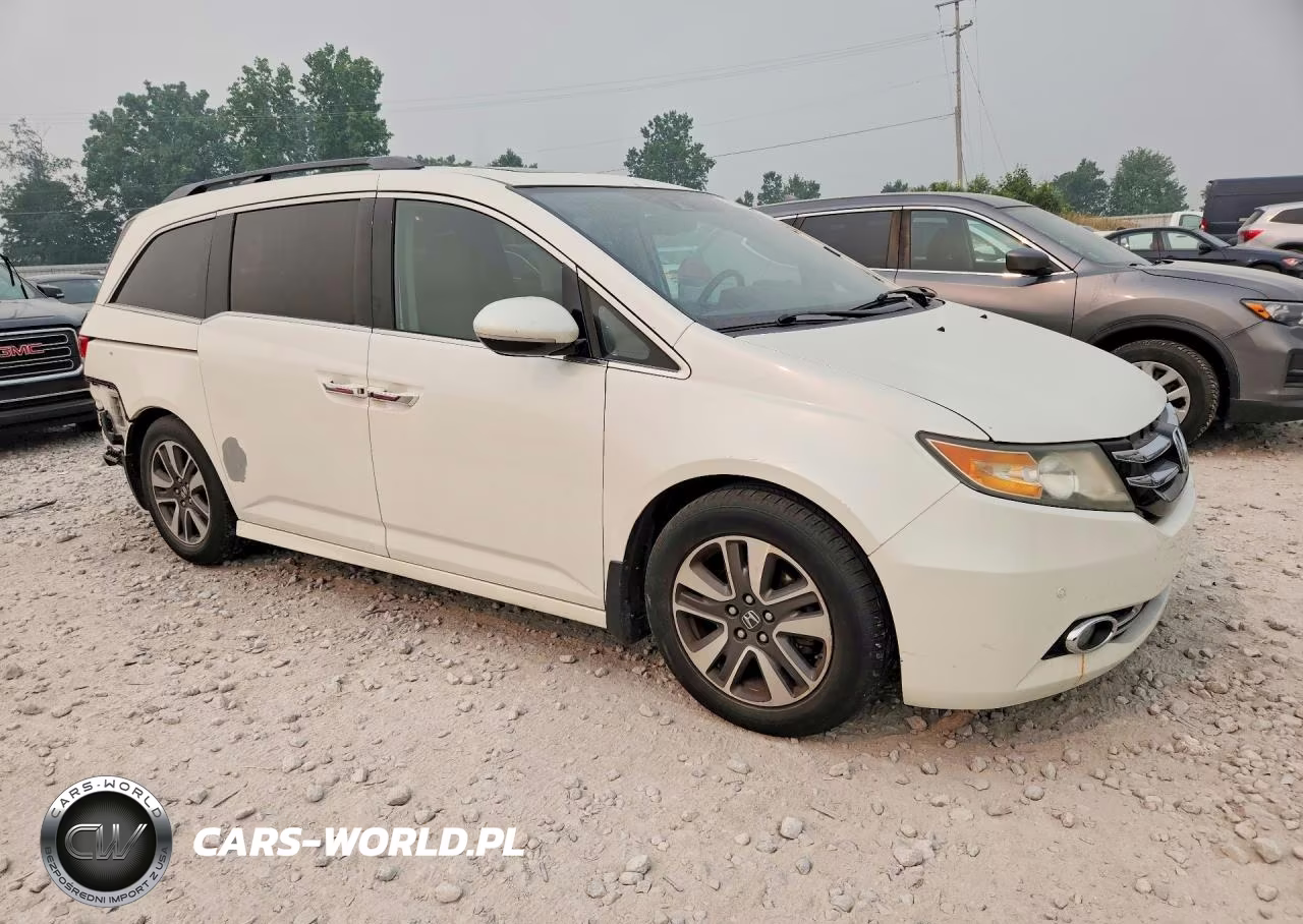 2014 Honda Odyssey Touring VIN:5FNRL5H99EB061287 - 4