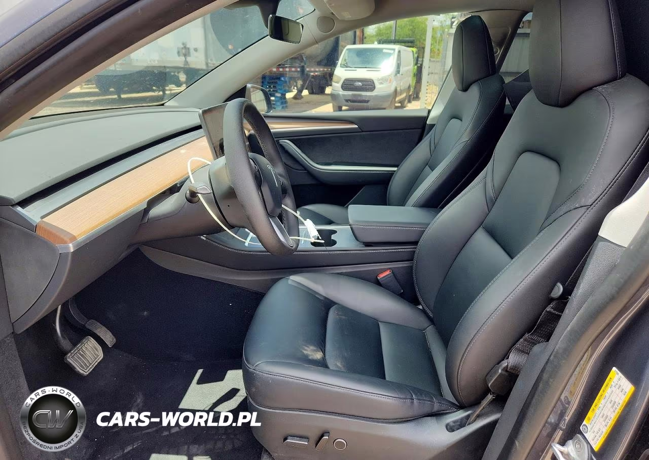 2023 Tesla Model Y VIN:7SAYGDEE4PA077685 - 7