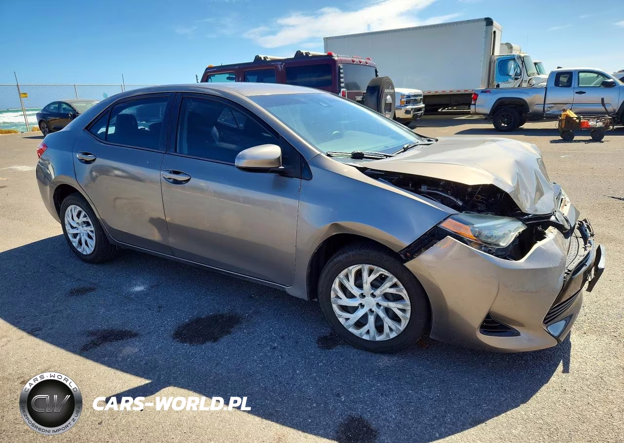 2018 Toyota Corolla L VIN:5YFBURHE7JP771645 - 4