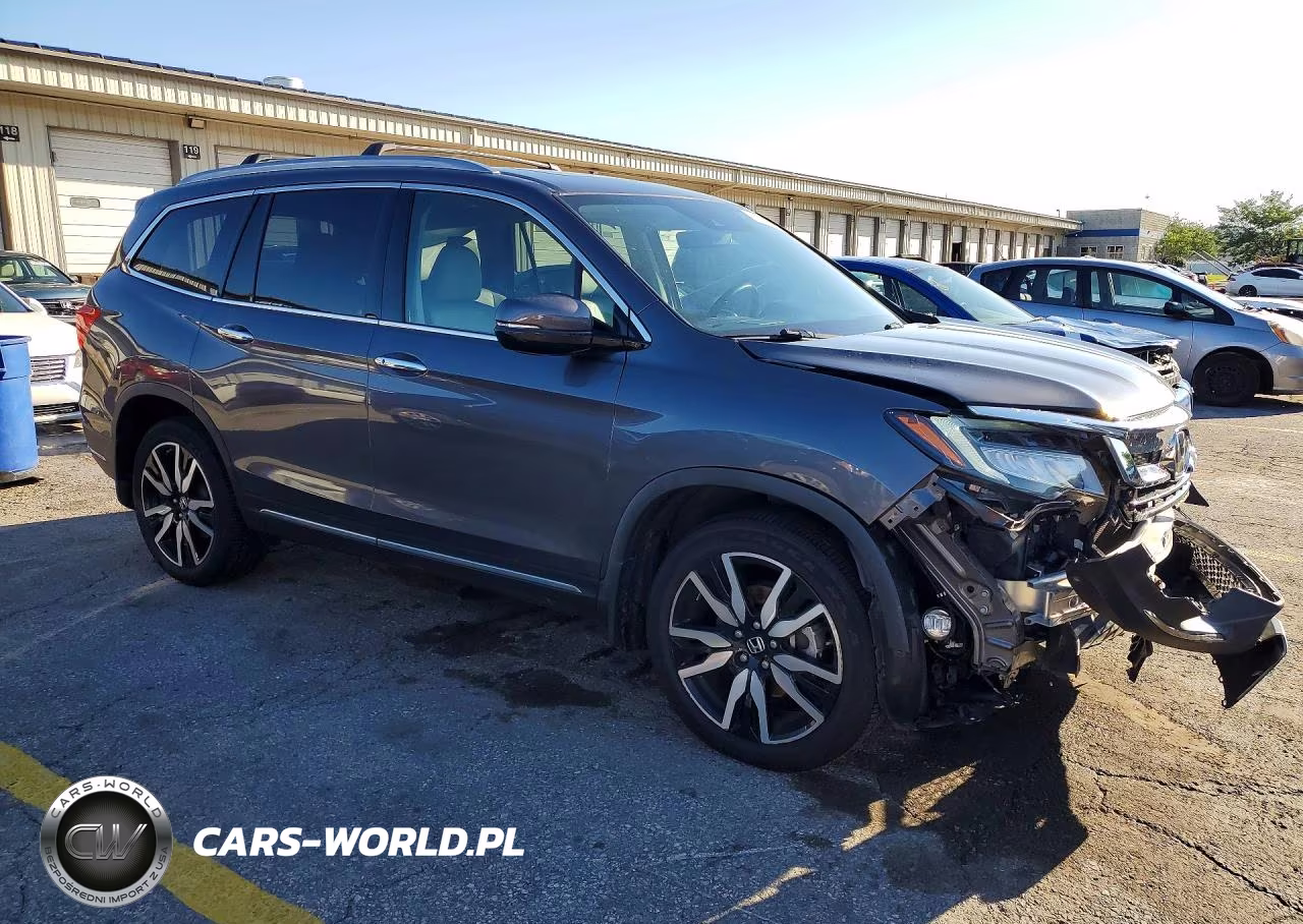 2022 Honda Pilot Touring VIN:5FNYF6H65NB051662 - 4