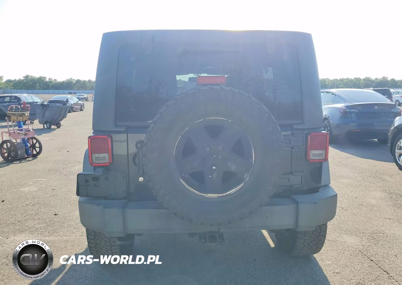 2013 Jeep Wrangler Unlimited Sport VIN:1C4BJWDG3DL677452 - 6