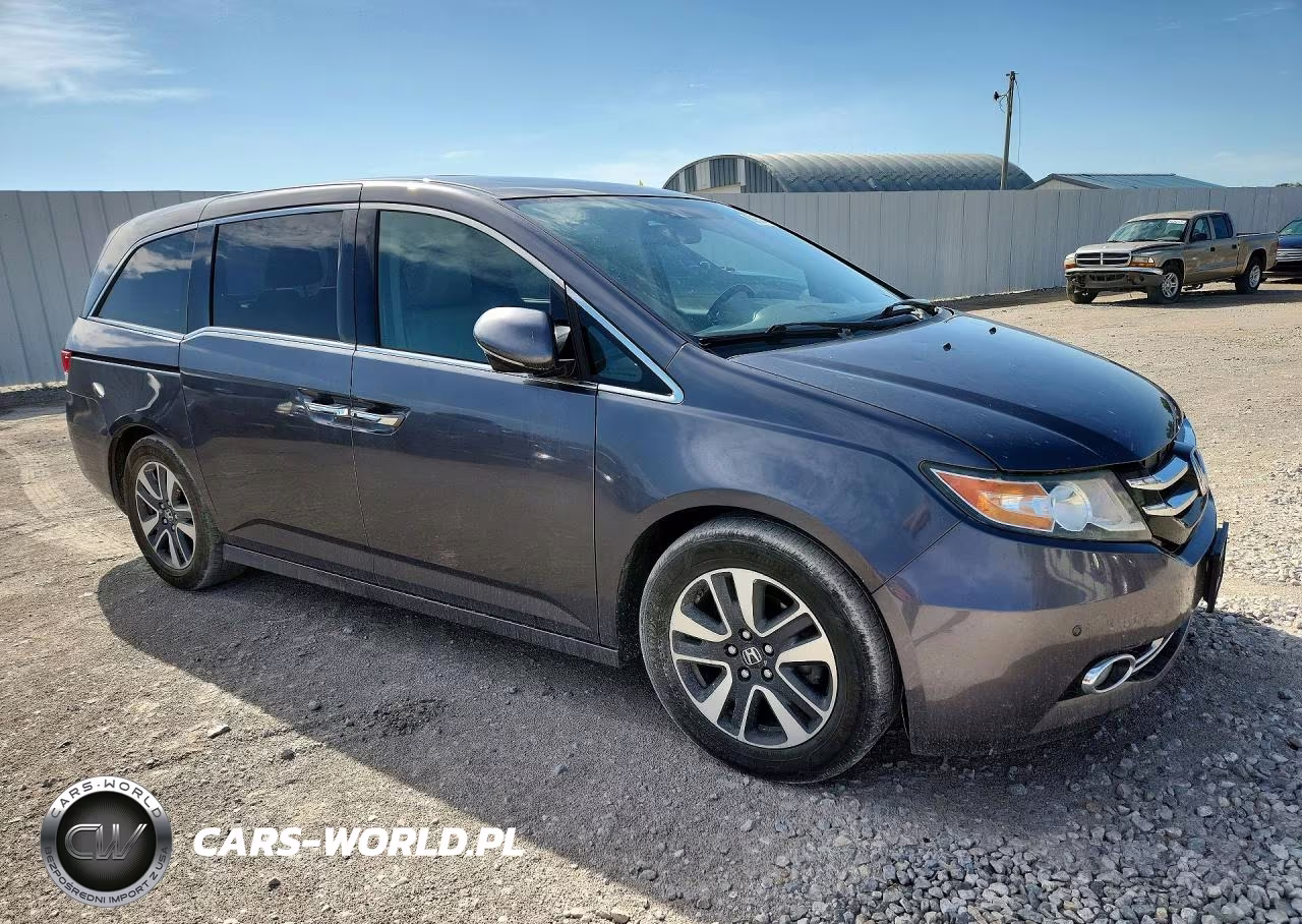 2015 Honda Odyssey Touring VIN:5FNRL5H97FB093513 - 4