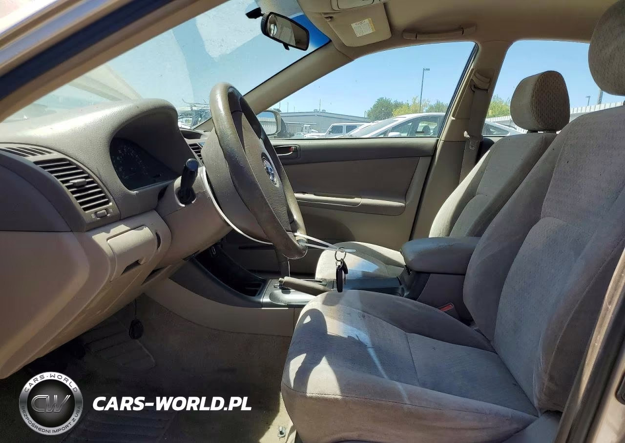2002 Toyota Camry Le VIN:JTDBE32K520115786 - 7