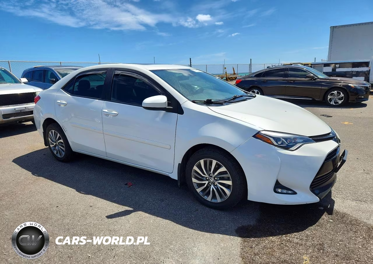 2018 Toyota Corolla VIN:5YFBURHEXJP823043 - 4