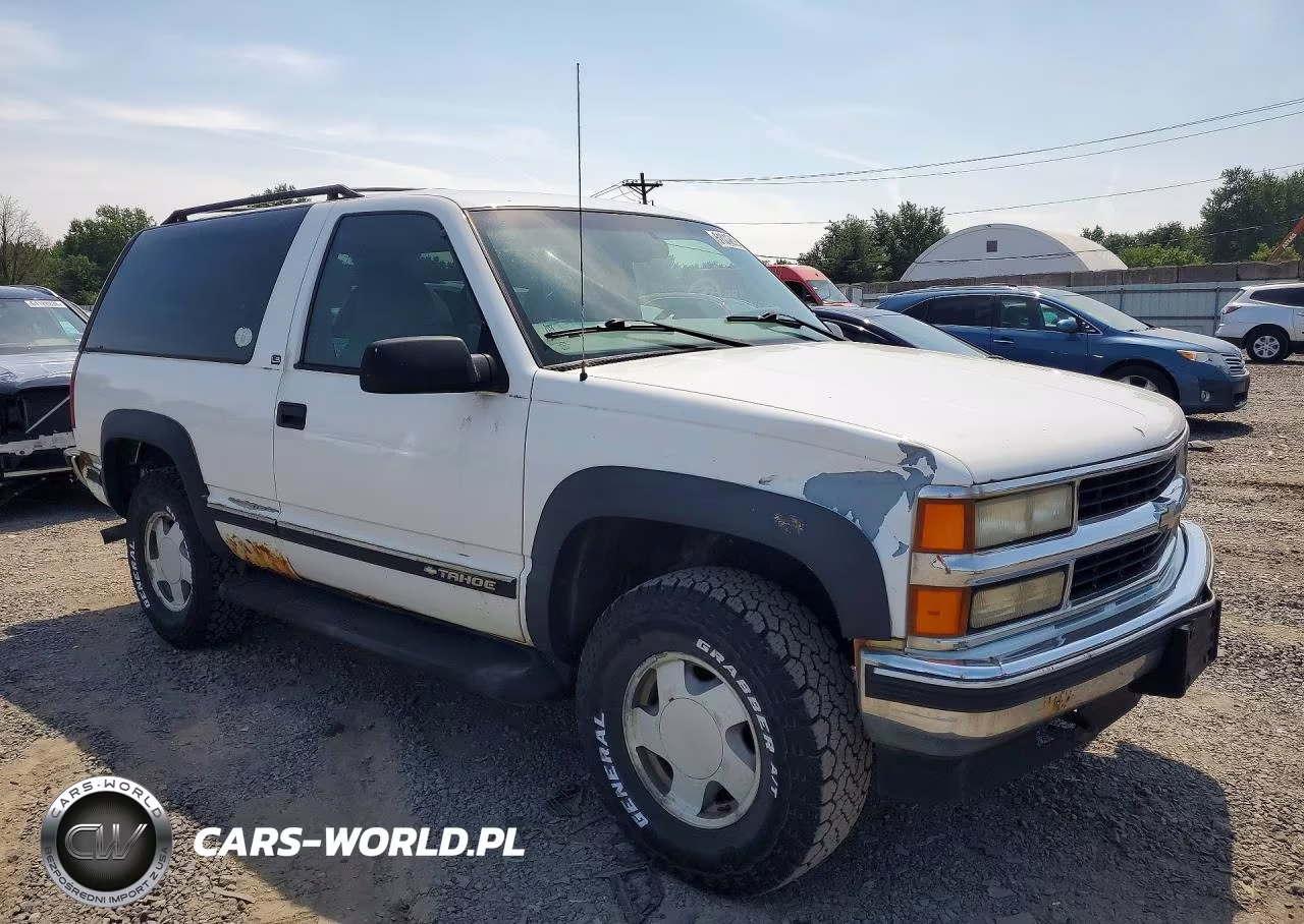 1999 Chevrolet Tahoe K1500 VIN:3GNEK18R0XG216890 - 4
