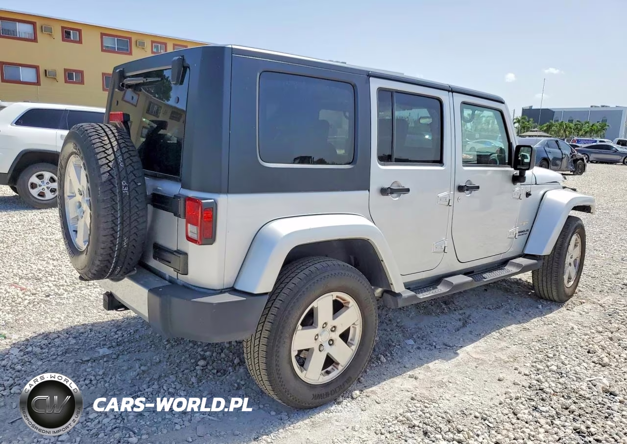 2009 Jeep Wrangler Unlimited Sahara VIN:1J8GA59159L735470 - 3