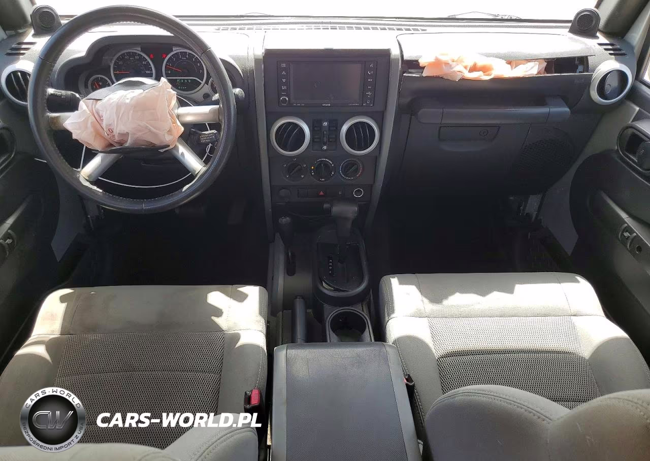 2009 Jeep Wrangler Unlimited Sahara VIN:1J8GA59159L735470 - 8