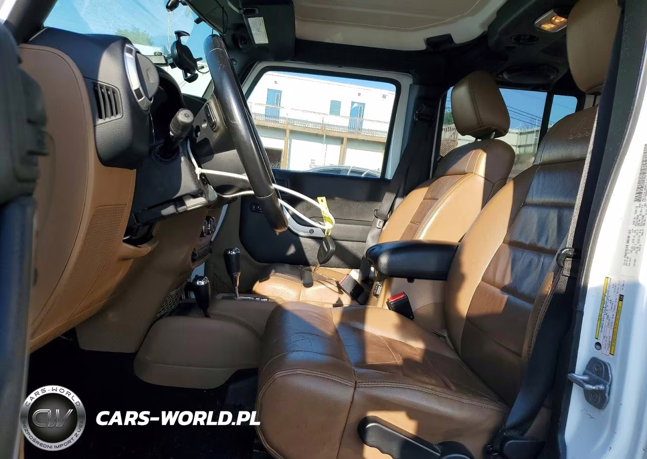 2012 Jeep Wrangler Unlimited Sahara VIN:1C4HJWEG8CL139112 - 7