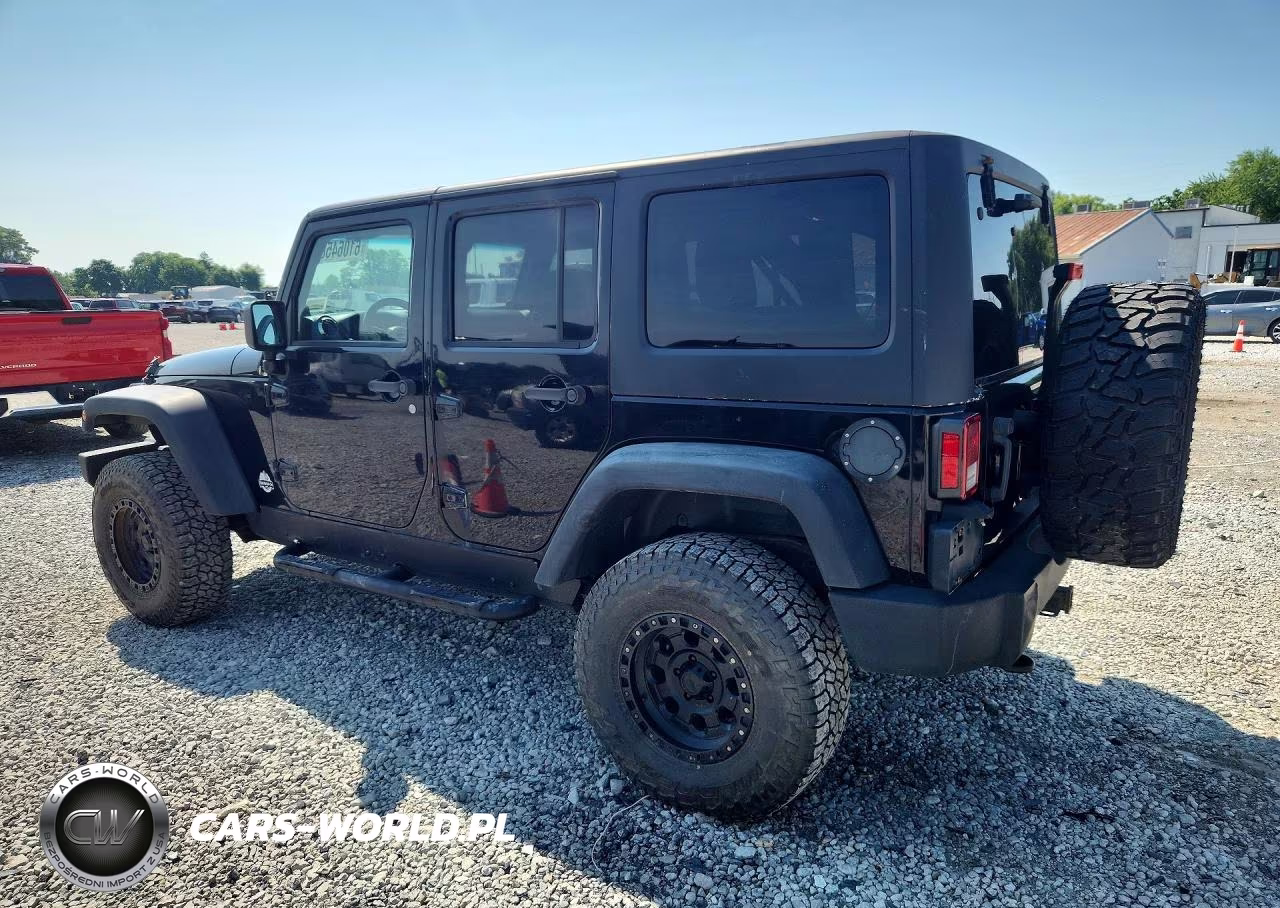 2011 Jeep Wrangler Unlimited Rubicon VIN:1J4BA6H14BL565420 - 2