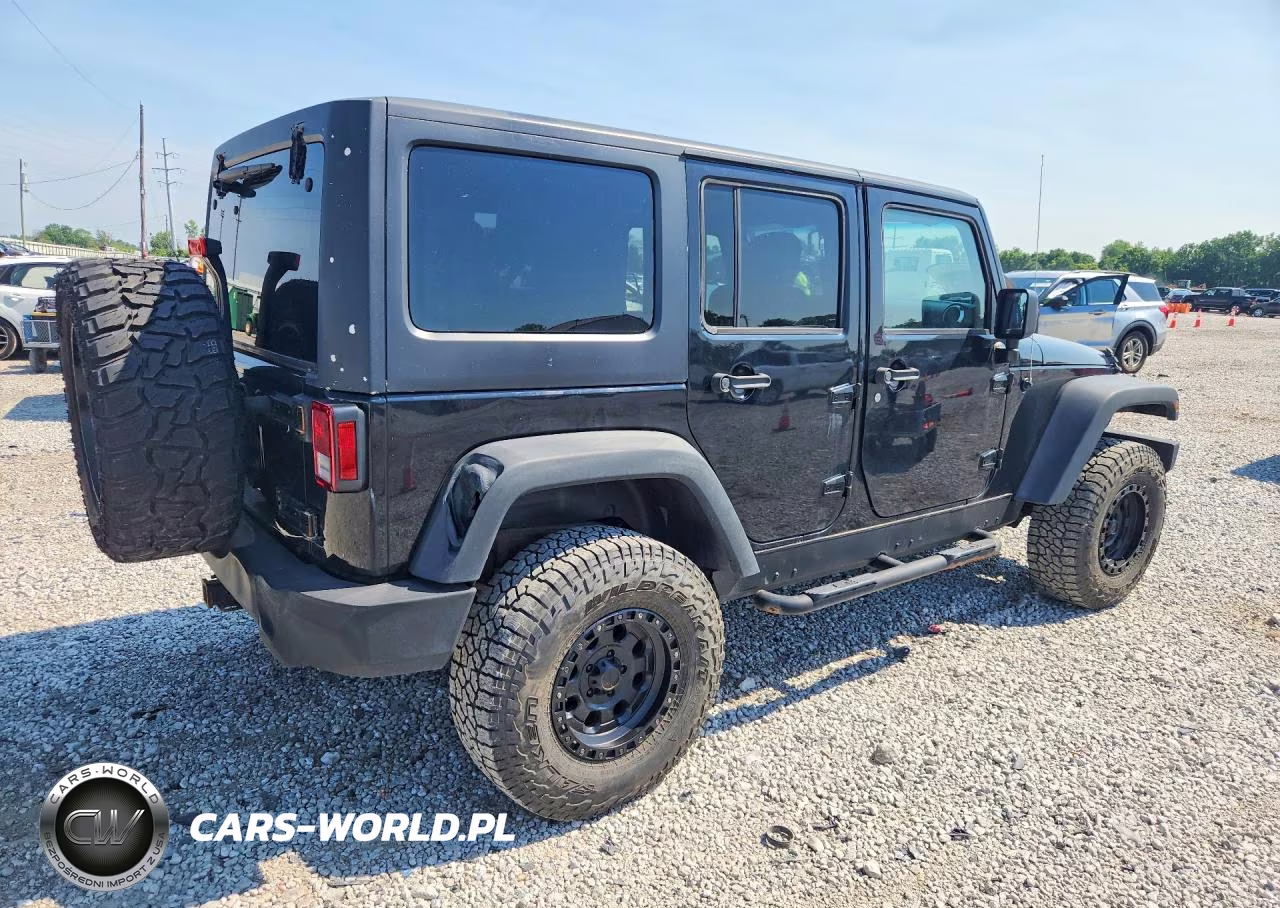 2011 Jeep Wrangler Unlimited Rubicon VIN:1J4BA6H14BL565420 - 3