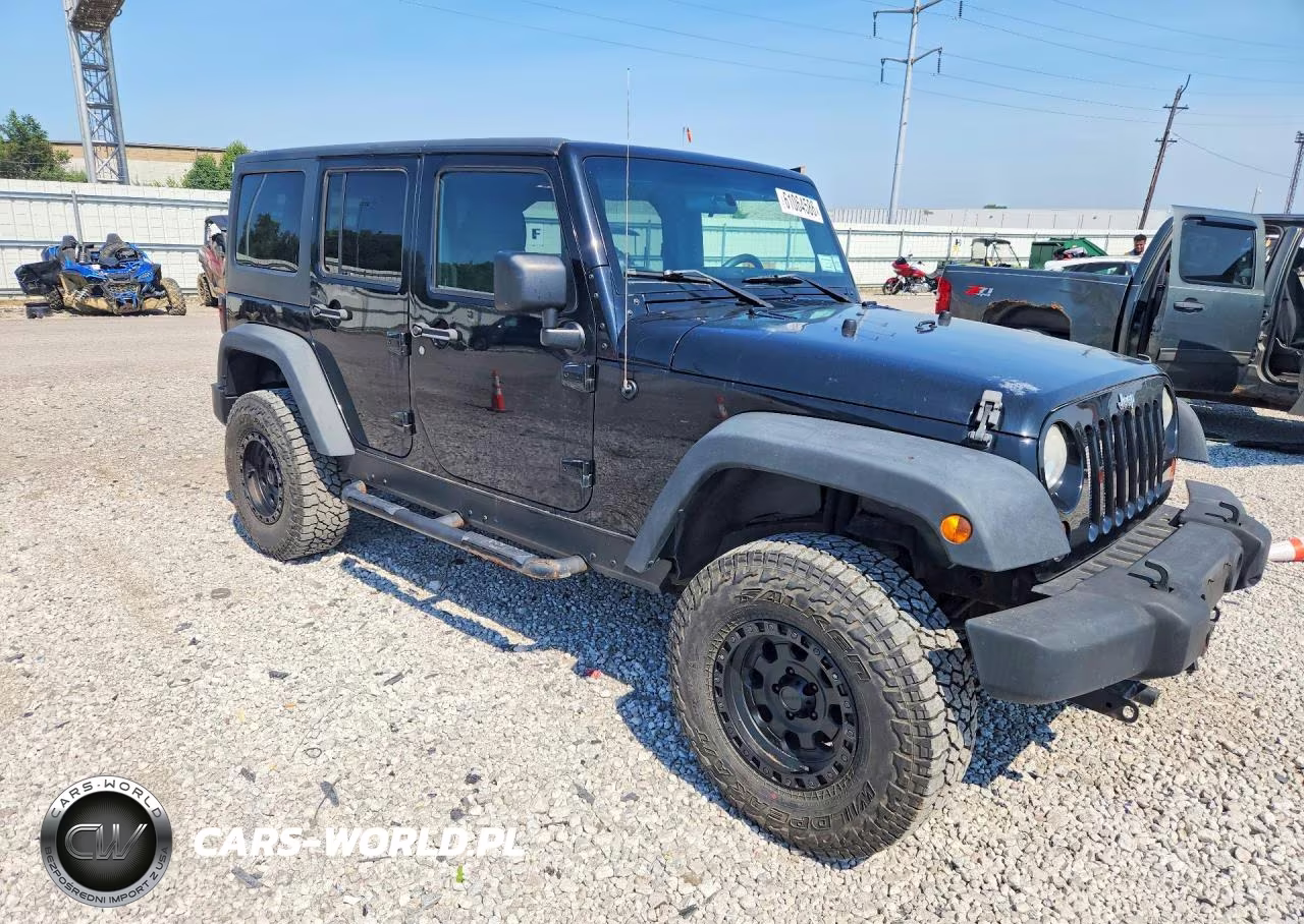 2011 Jeep Wrangler Unlimited Rubicon VIN:1J4BA6H14BL565420 - 4