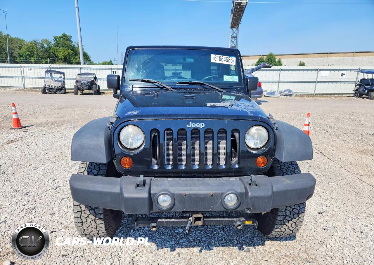 2011 Jeep Wrangler Unlimited Rubicon VIN:1J4BA6H14BL565420 - 5