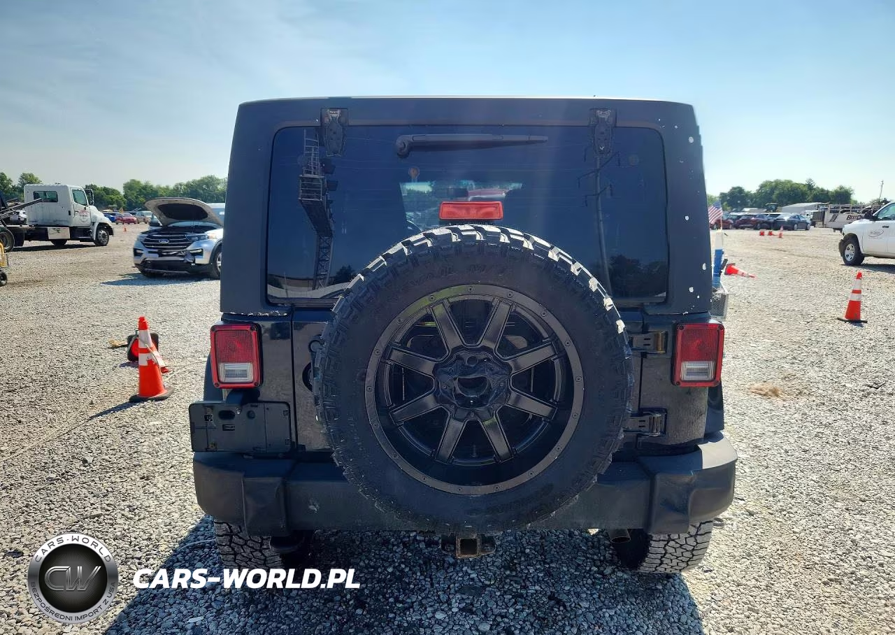 2011 Jeep Wrangler Unlimited Rubicon VIN:1J4BA6H14BL565420 - 6