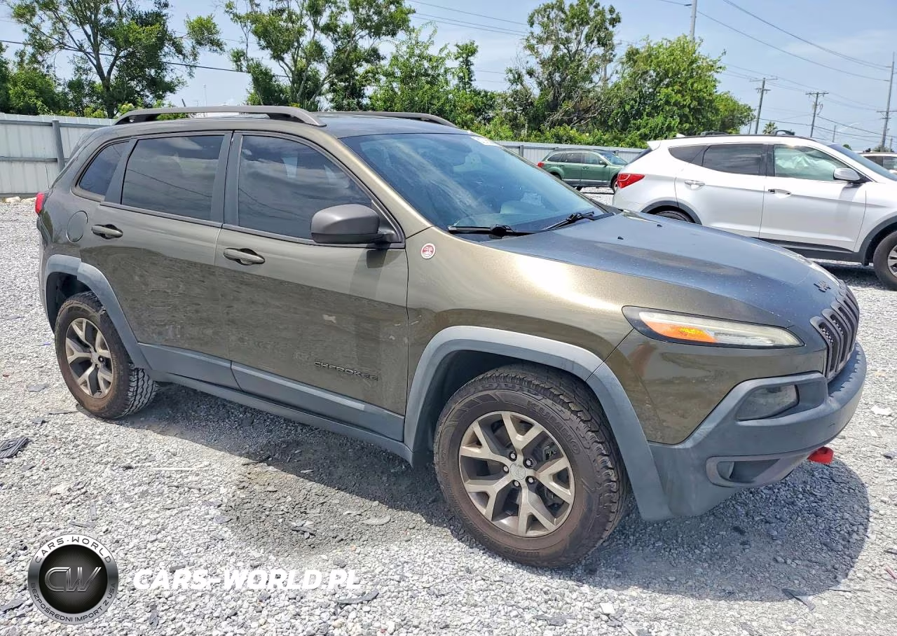 2015 Jeep Cherokee Trailhawk VIN:1C4PJMBS6FW717025 - 4