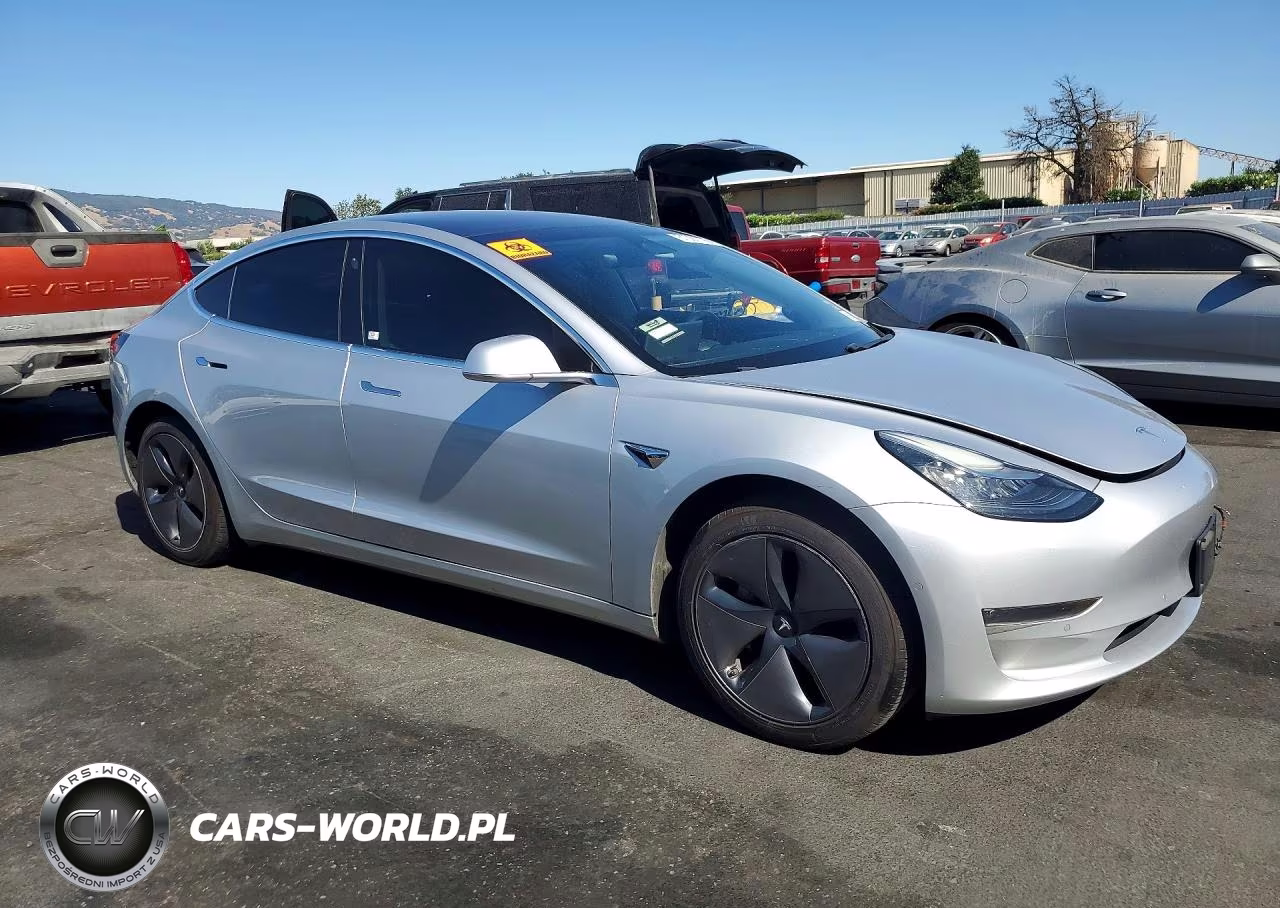 2018 Tesla Model 3 VIN:5YJ3E1EA5JF007003 - 4