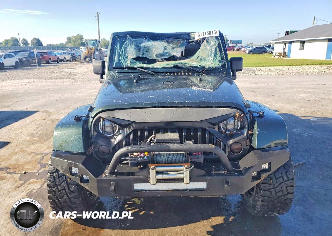 2010 Jeep Wrangler Unlimited Sahara VIN:1J4HA5H15AL146026 - 5