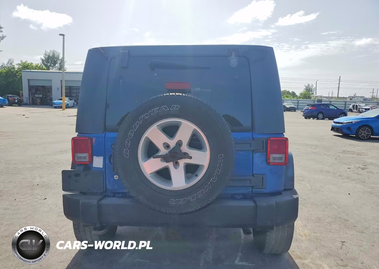 2010 Jeep Wrangler Sahara VIN:1J4BA5H1XAL119846 - 6