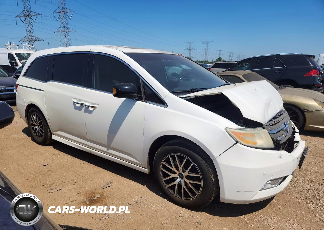 2011 Honda Odyssey Touring VIN:5FNRL5H90BB084467 - 4