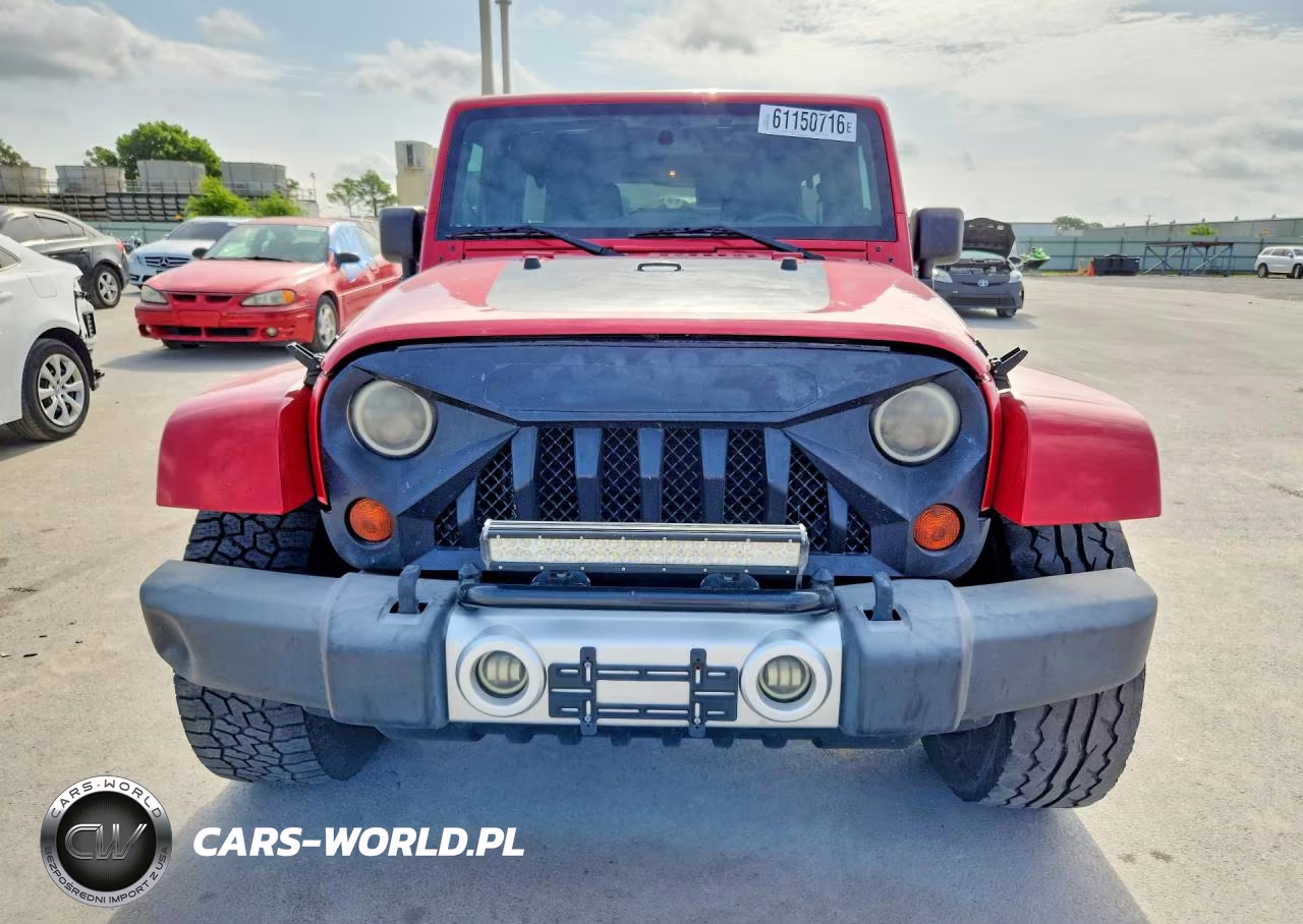 2012 Jeep Wrangler Unlimited Sahara VIN:1C4BJWEGXCL241260 - 5