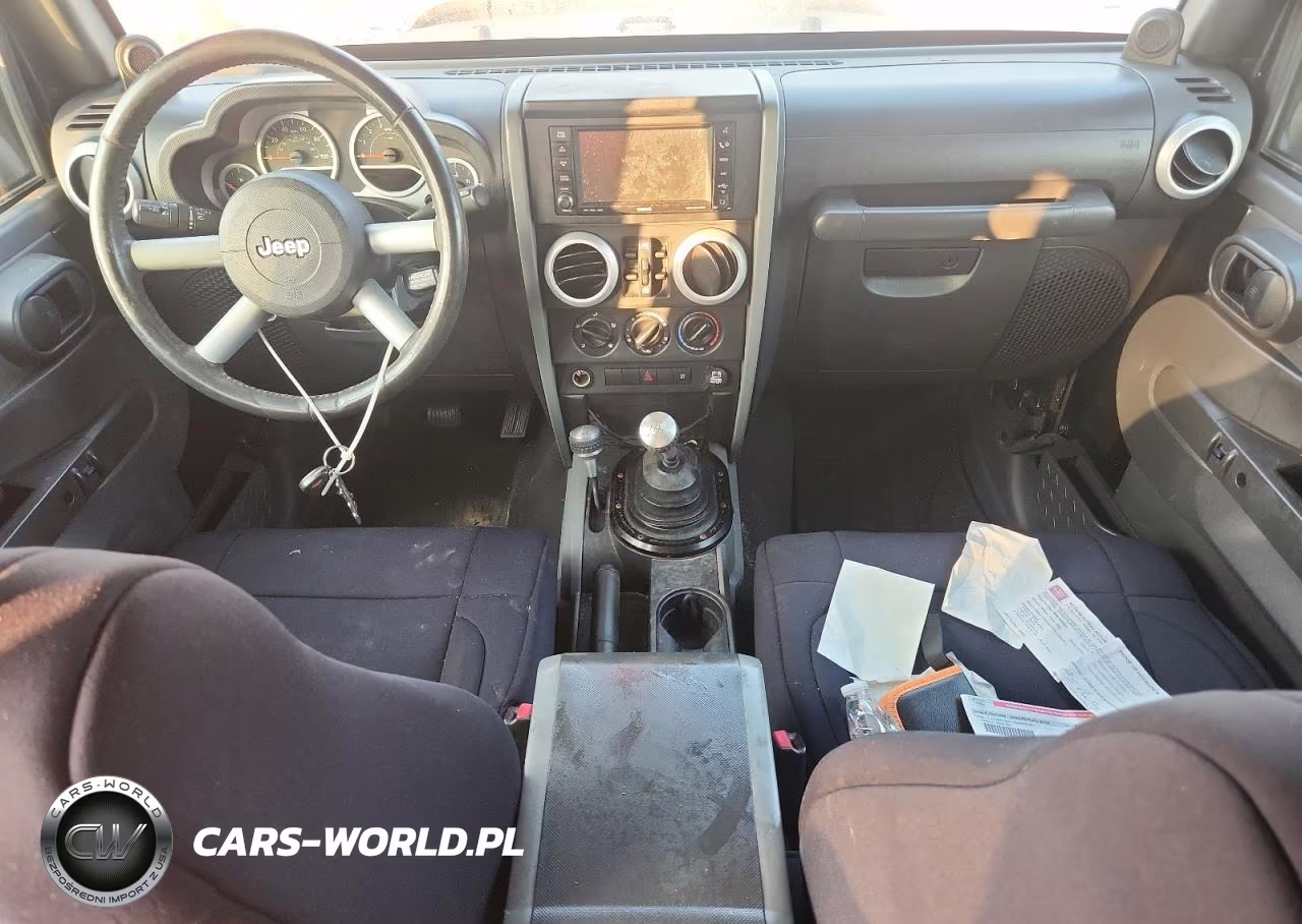 2012 Jeep Wrangler VIN:1J4GA591X9L704071 - 8