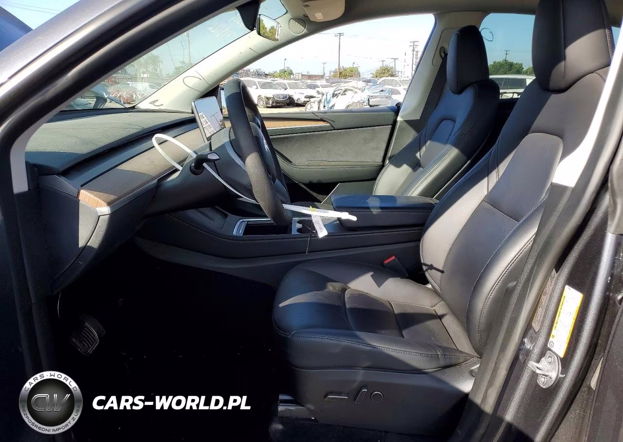 2023 Tesla Model Y VIN:7SAYGDEE3PF909584 - 7