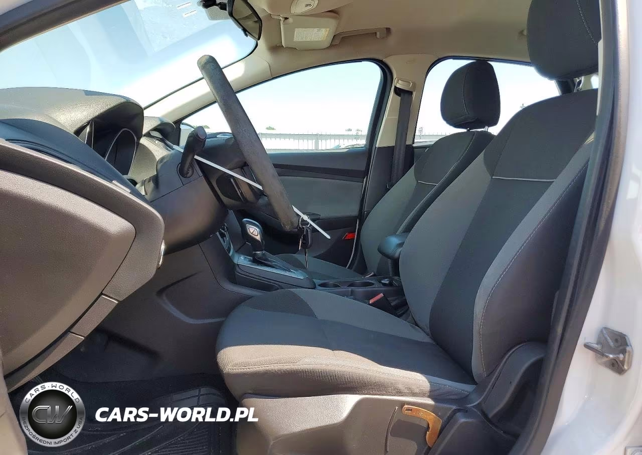 2012 Ford Focus VIN:1FAHP3F20CL458123 - 7