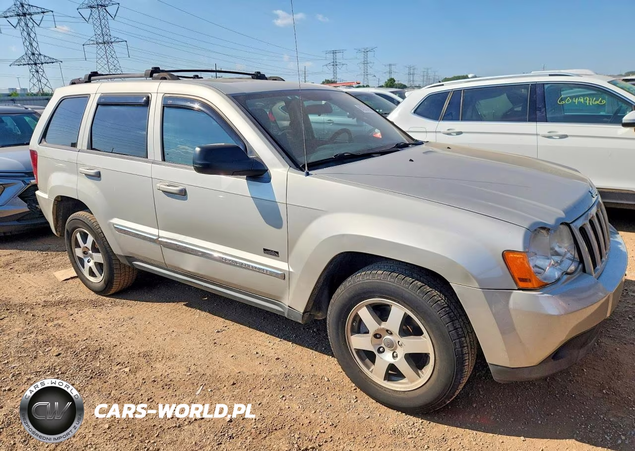 2009 Jeep Grand Cherokee Laredo VIN:1J8GR48K69C555542 - 4