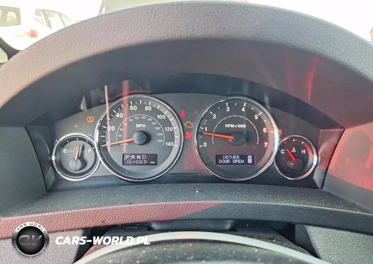 2009 Jeep Grand Cherokee Laredo VIN:1J8GR48K69C555542 - 9