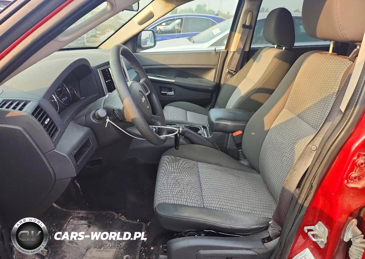 2009 Jeep Grand Cherokee Laredo VIN:1J8GR48K79C556330 - 7